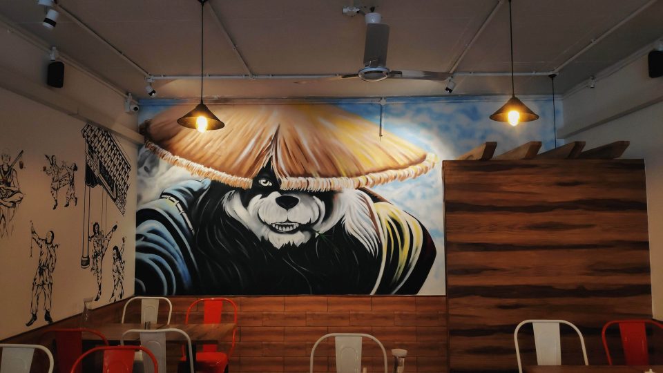 panda mural in cafe