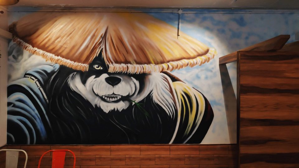 panda mural in cafe