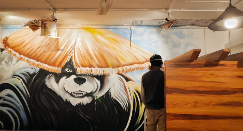 panda mural in cafe